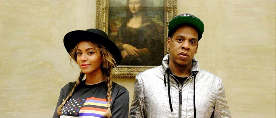 Beyonce and Jay Z in front of the Mona Lisa at the Louvre
