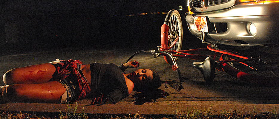 Marie Mendez imagines her demise while riding a bicycle and being hit by a fast moving truck