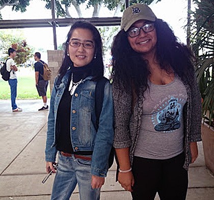 photo of Teresa Fei and Veroinca Meza  standing side by side in the CSULB School of Art, Art Gallery Courtyard
