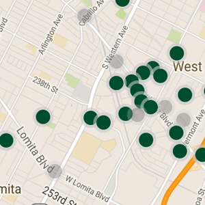 screencap from the Geocaching mobile app showing caches near the user